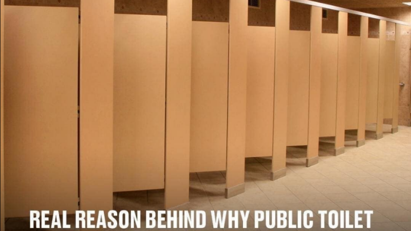 Why do public bathroom doors not reach the floor?