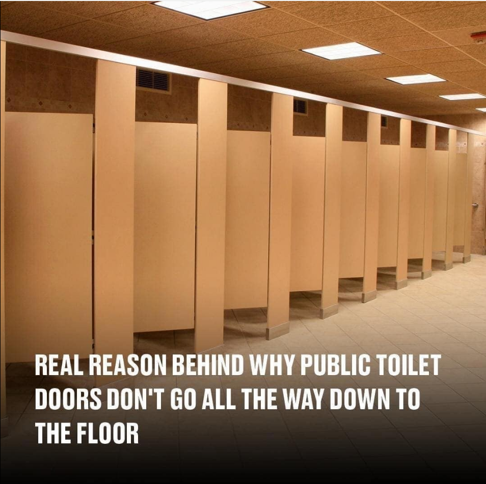 Why do public bathroom doors not reach the floor?